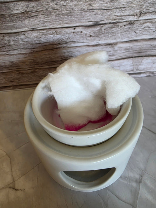 Removing old wax from wax burner